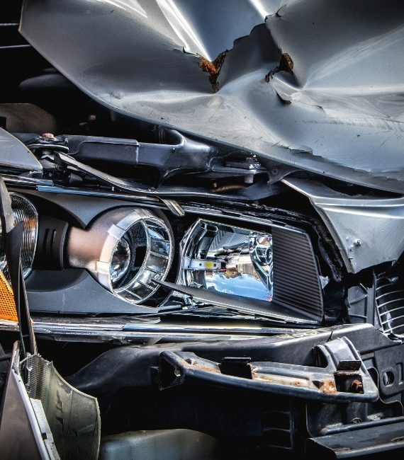 Close up of a car front bumper after an accident